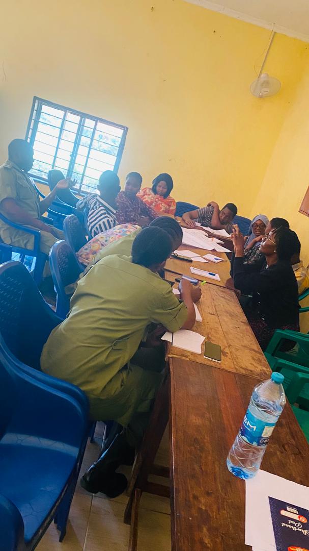 Women take part in a facilitated community discussion.